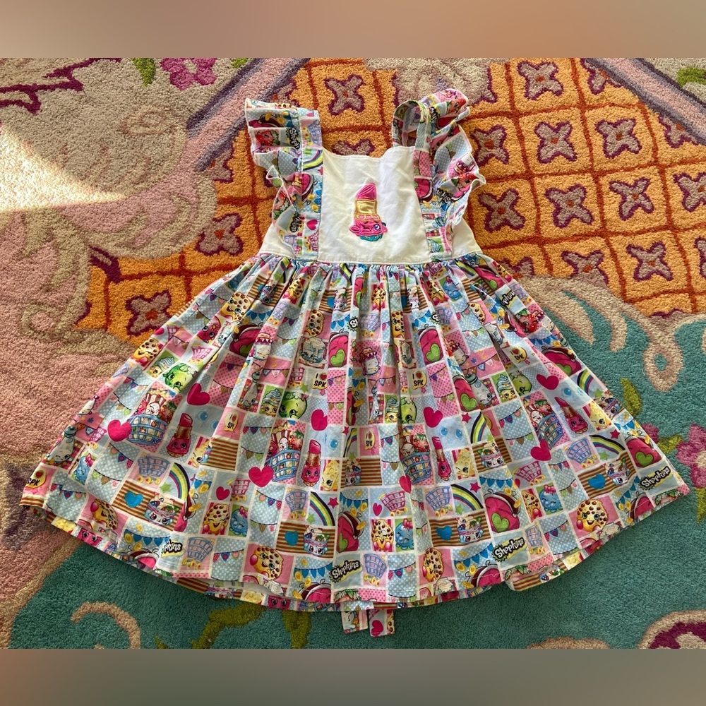 Shopkin custom pinafore dress
Colorful Patchwork Dress with Ruffle Sleeves